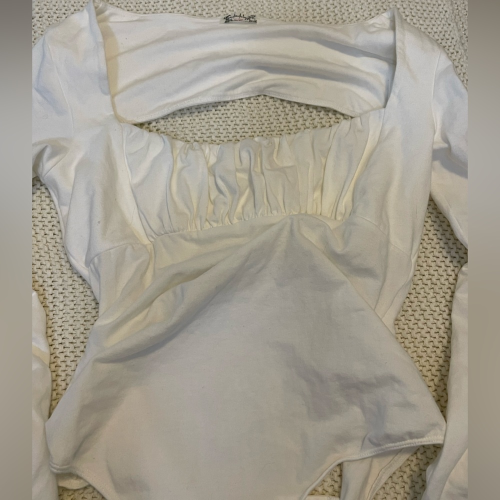 🇨🇦Free people open back bodysuit
